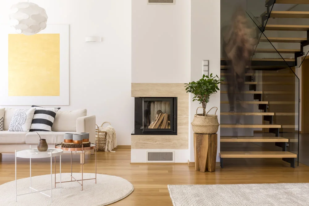 Modern living room with fireplace and staircase